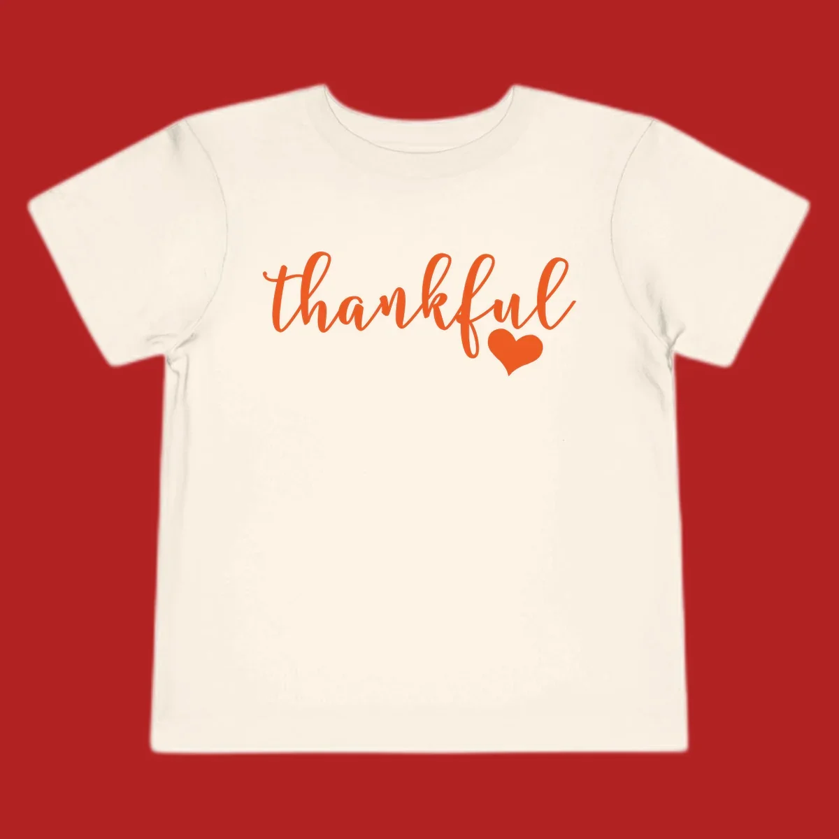 Orange script text 'thankful' with a heart accent, thankful-heart-script.