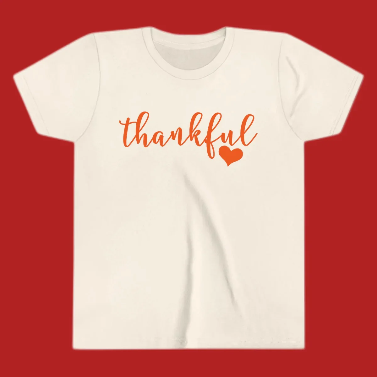 Orange script text 'thankful' with a heart accent, thankful-heart-script.