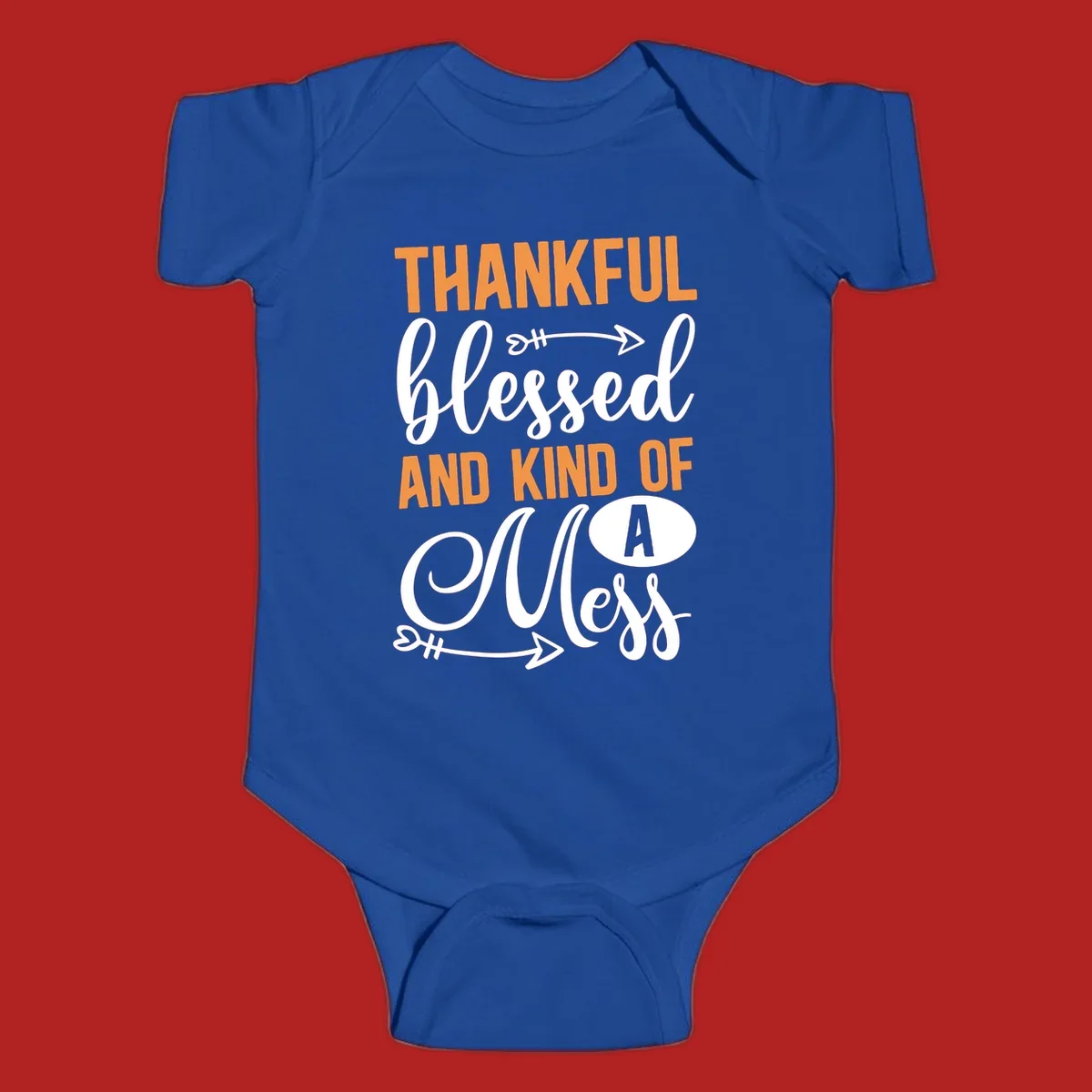 Thankful Blessed And Kind Of A Mess typography design with orange and white text on black background.