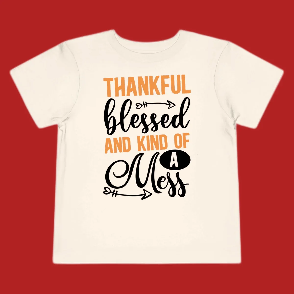 Thankful Blessed And Kind Of A Mess typography design with orange and white text on black background.