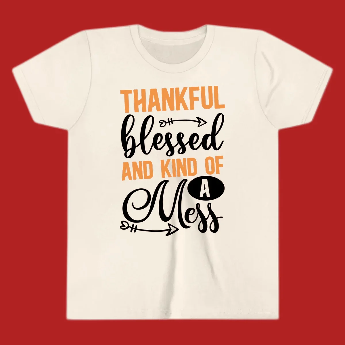 Thankful Blessed And Kind Of A Mess typography design with orange and white text on black background.