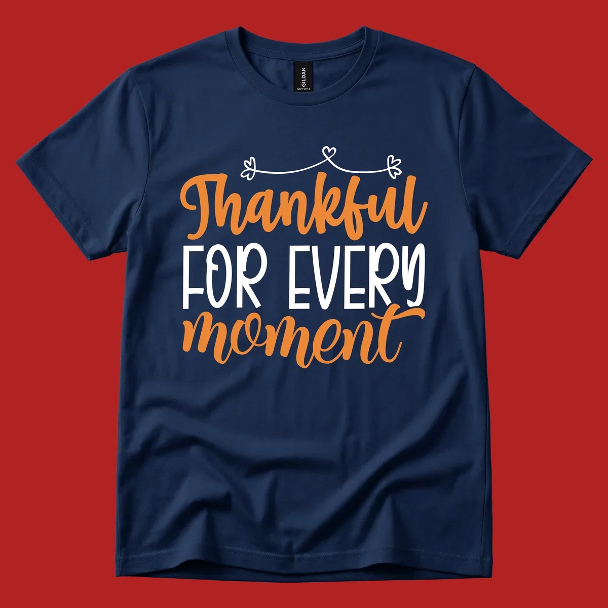 Thankful for every moment text design with orange and white lettering on black background.