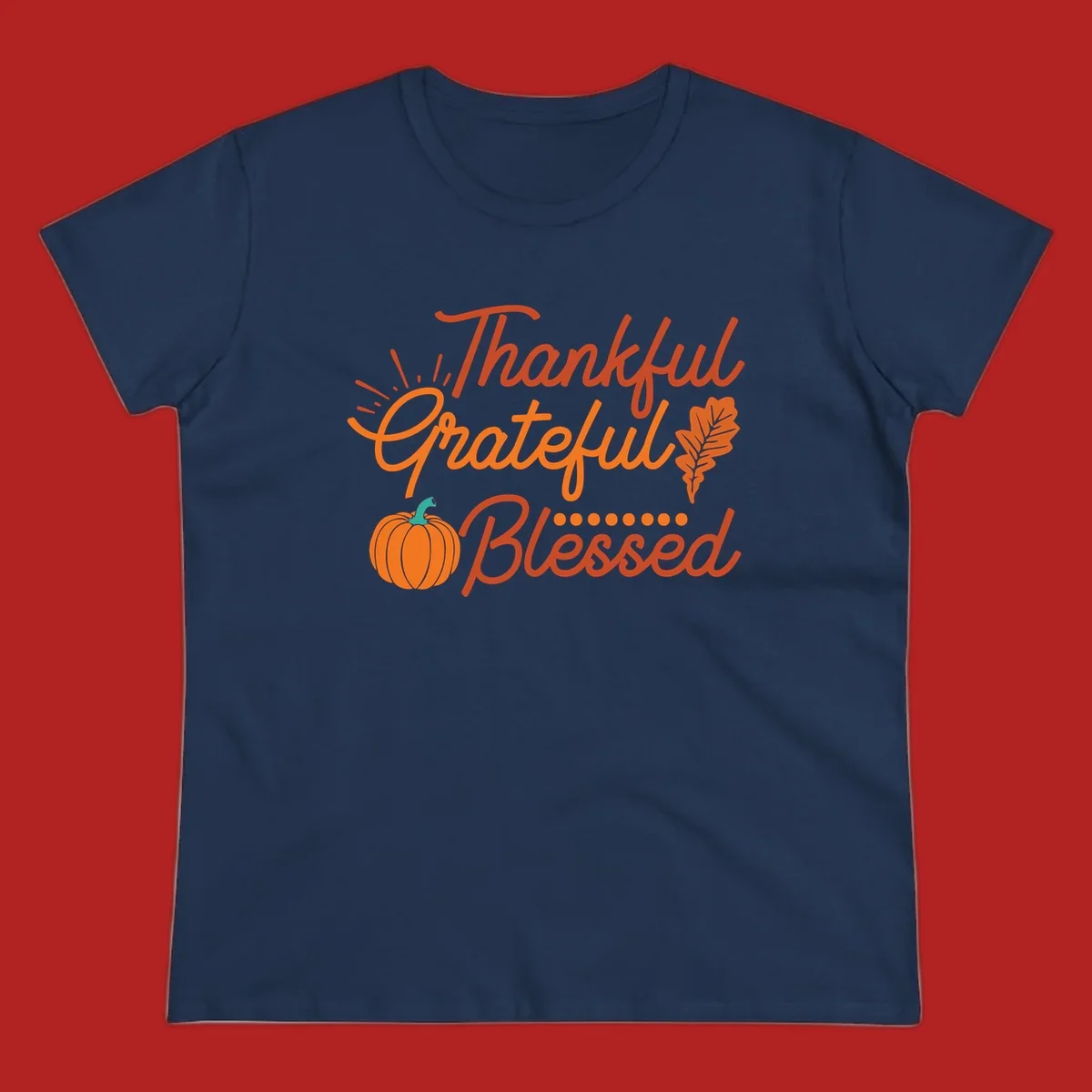 Thankful Grateful Blessed Thanksgiving design with pumpkin and oak leaf.