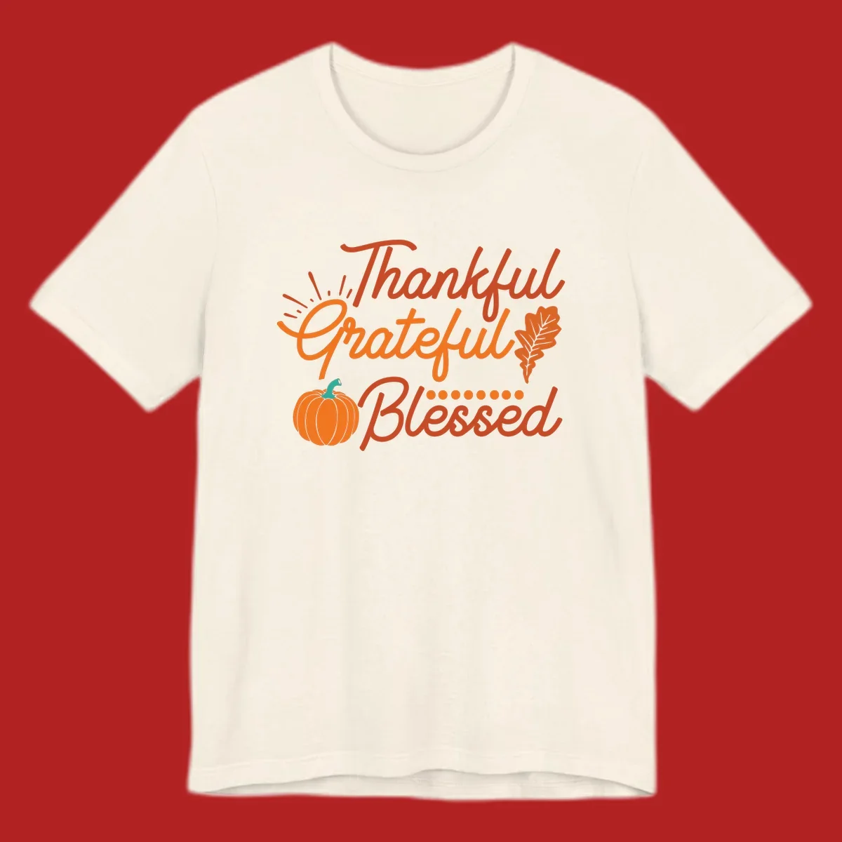 Thankful Grateful Blessed Thanksgiving design with pumpkin and oak leaf.