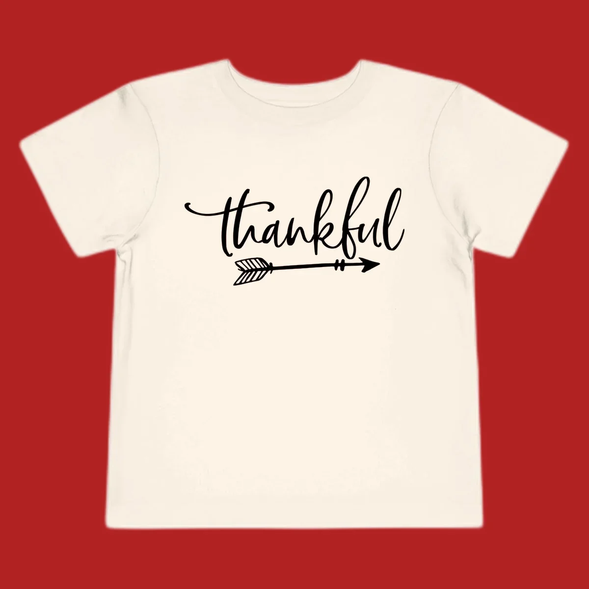 Thankful text with arrow graphic.