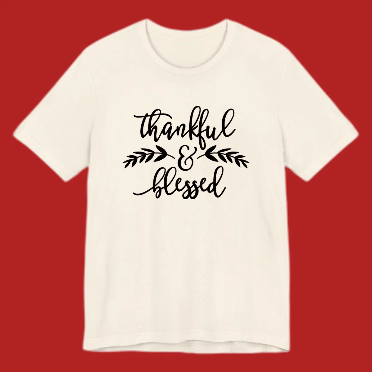 Thankful and Blessed script text with decorative leaves.