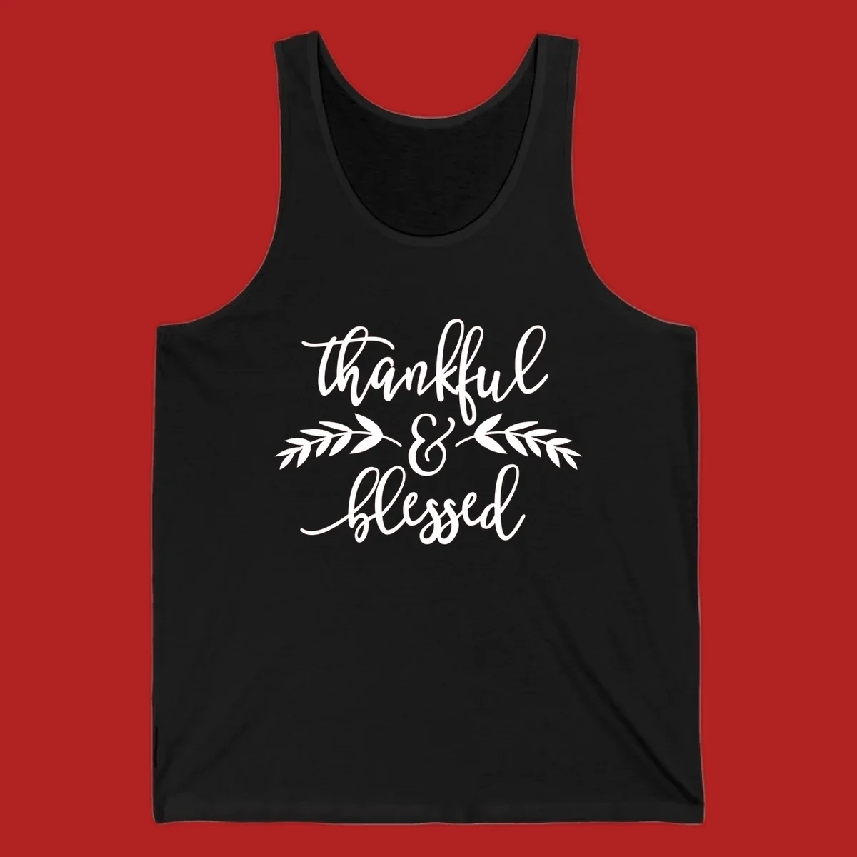Thankful and Blessed script text with decorative leaves.