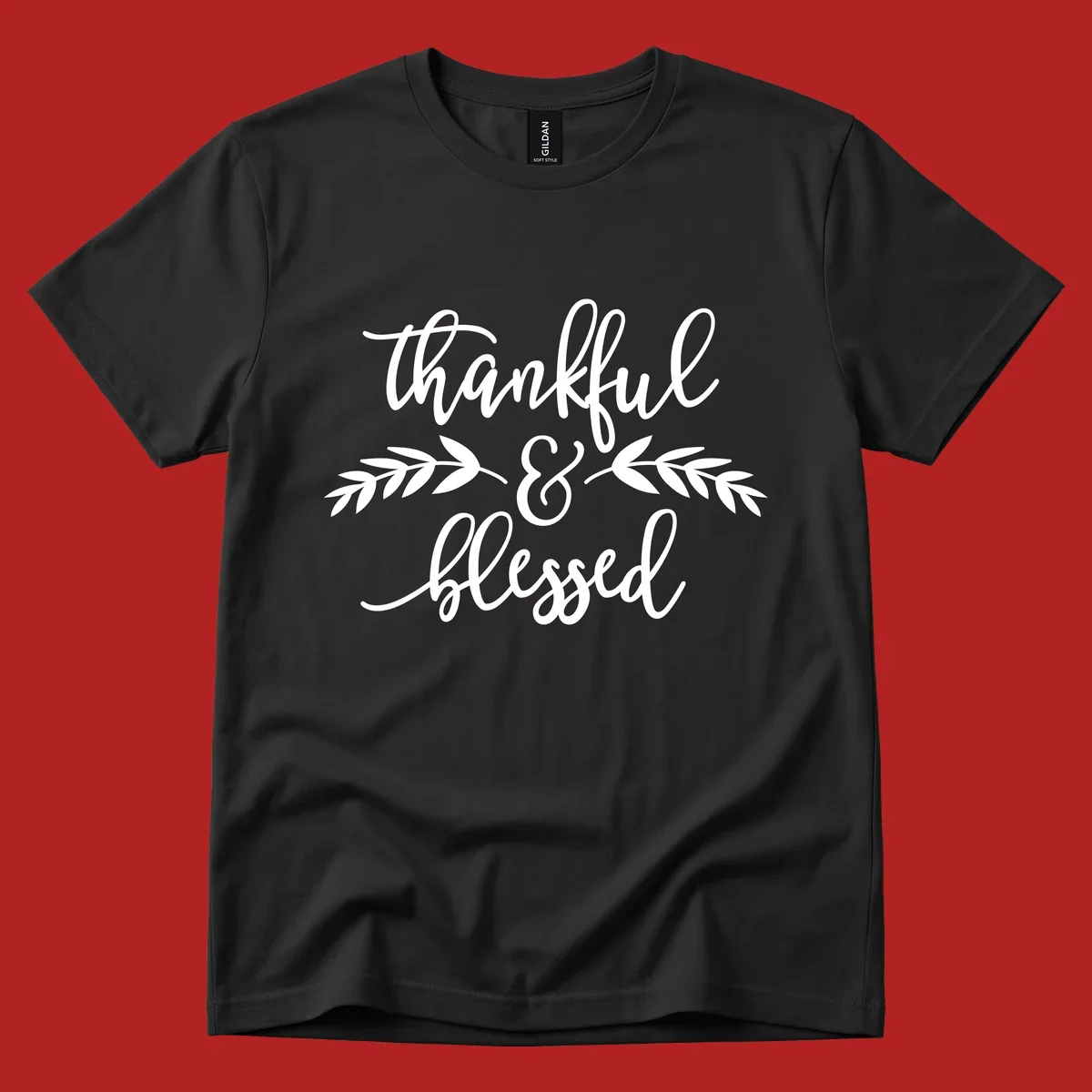 Thankful and Blessed script text with decorative leaves.