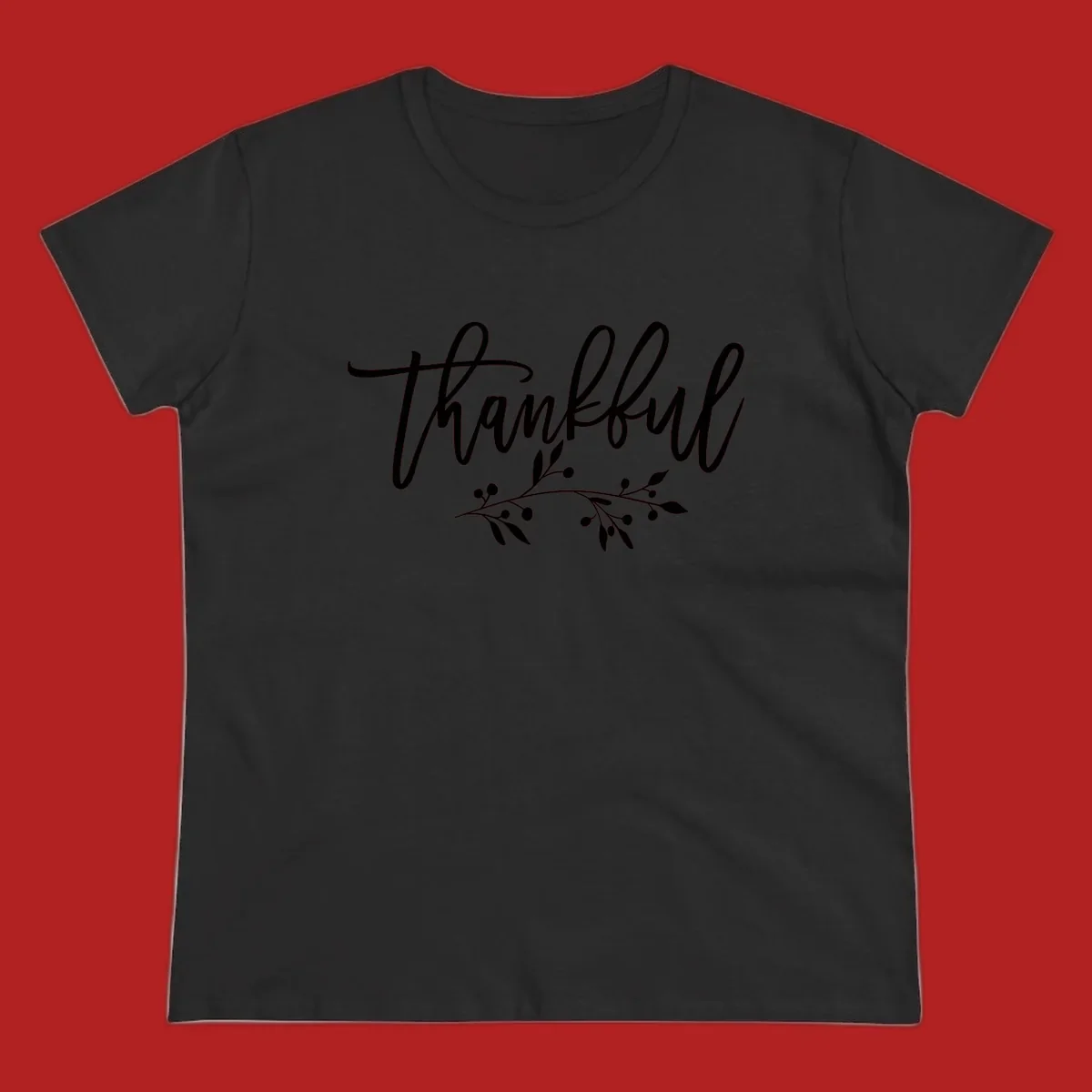 Elegant script text 'Thankful' with a small botanical branch accent, on a plain background.