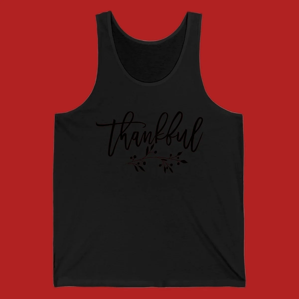 Elegant script text 'Thankful' with a small botanical branch accent, on a plain background.