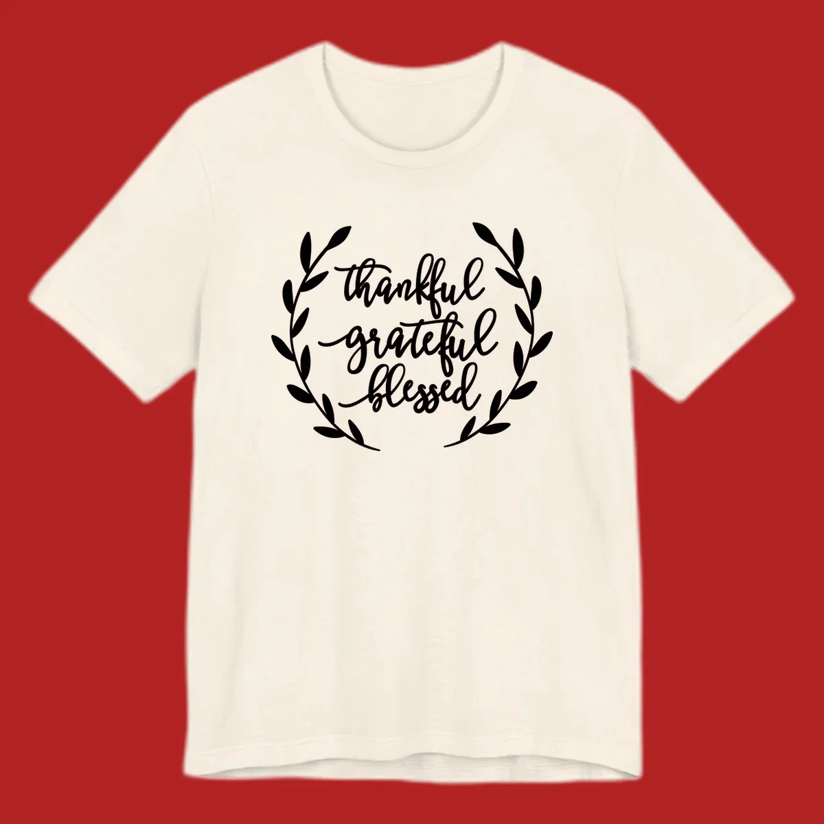 Thankful grateful blessed text inside a wreath graphic.