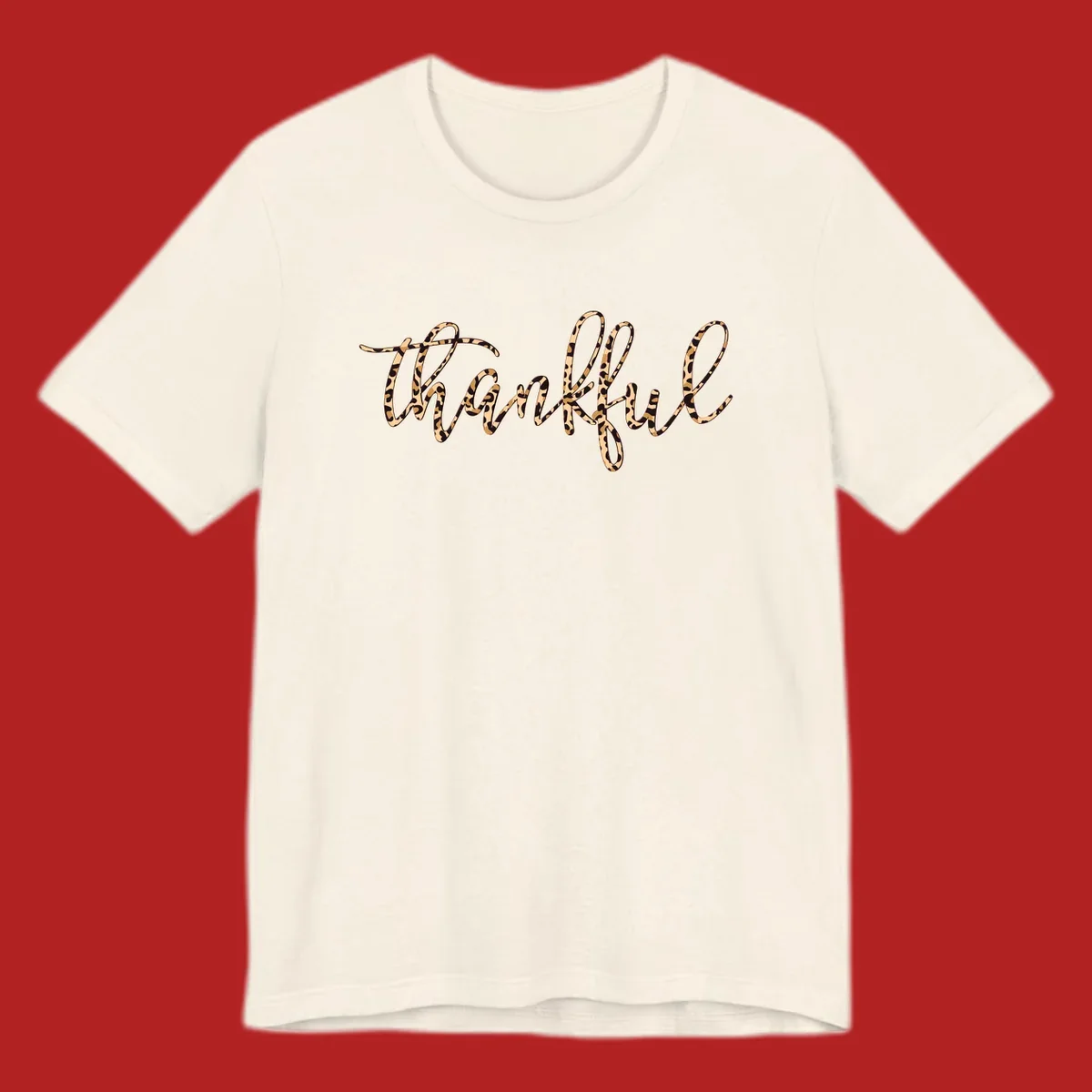 Thankful text in leopard print with a white outline.