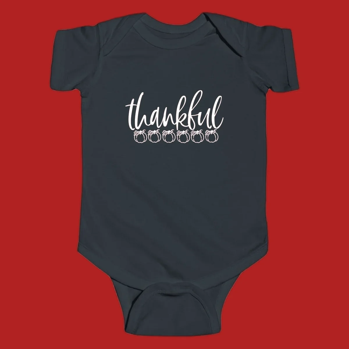 White script text 'thankful' above six white pumpkin illustrations, thankful pumpkins thanksgiving