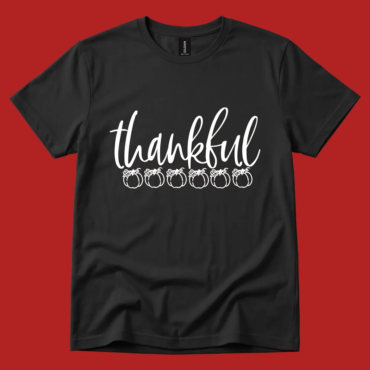 White script text 'thankful' above six white pumpkin illustrations, thankful pumpkins thanksgiving