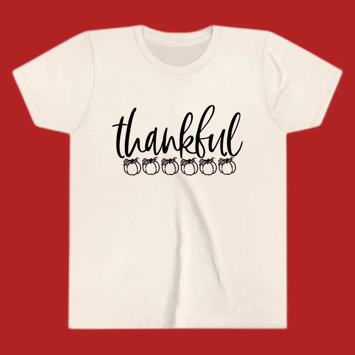 White script text 'thankful' above six white pumpkin illustrations, thankful pumpkins thanksgiving