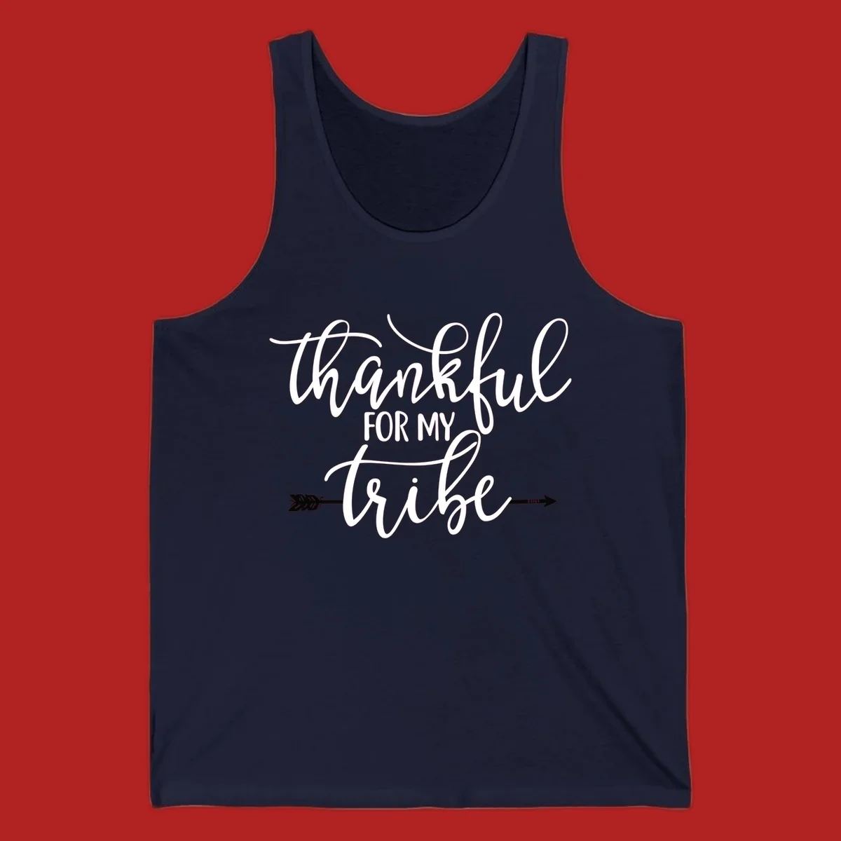 Thankful for my tribe typography design with arrow graphic on black background.