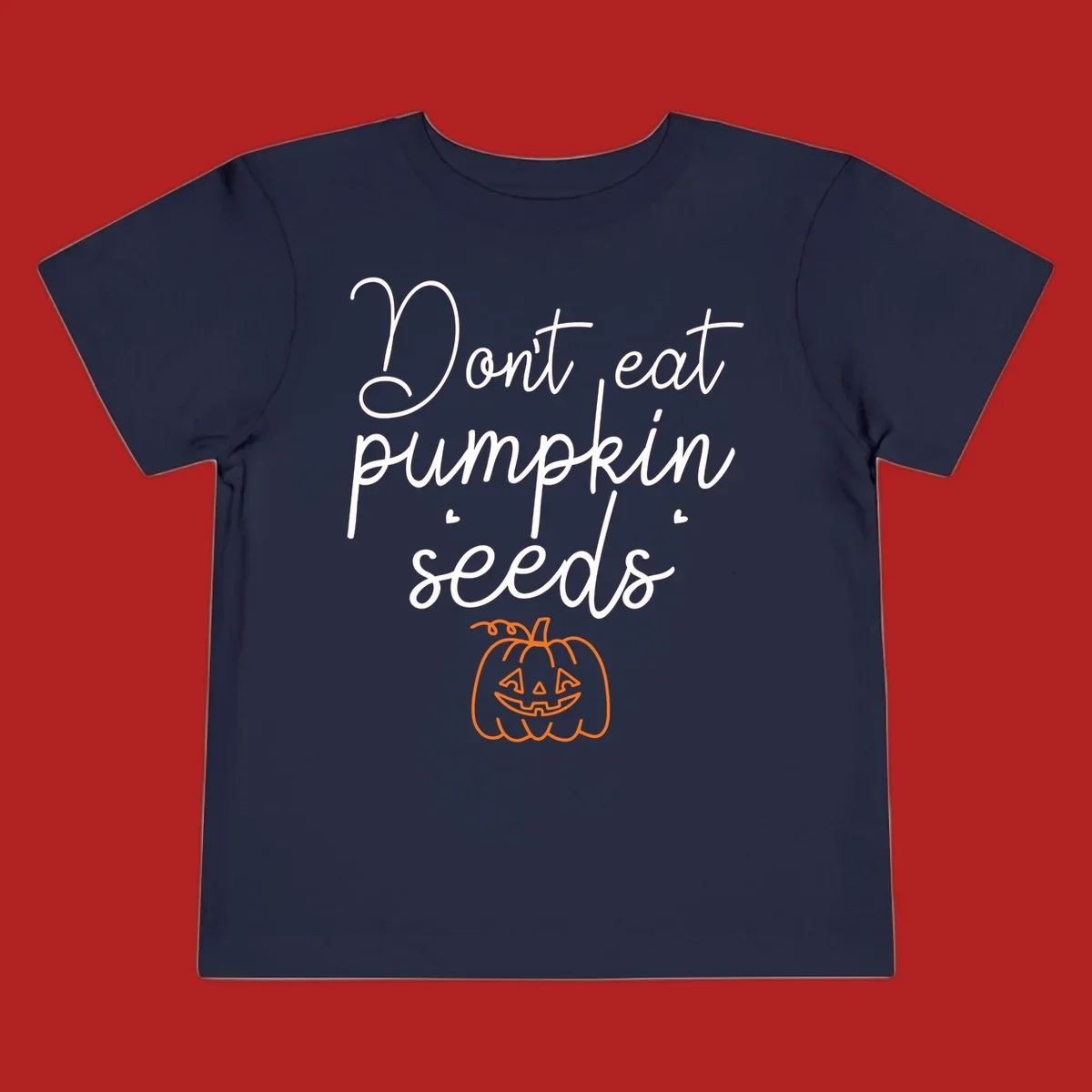 Don't eat pumpkin seeds Halloween text with jack-o-lantern illustration