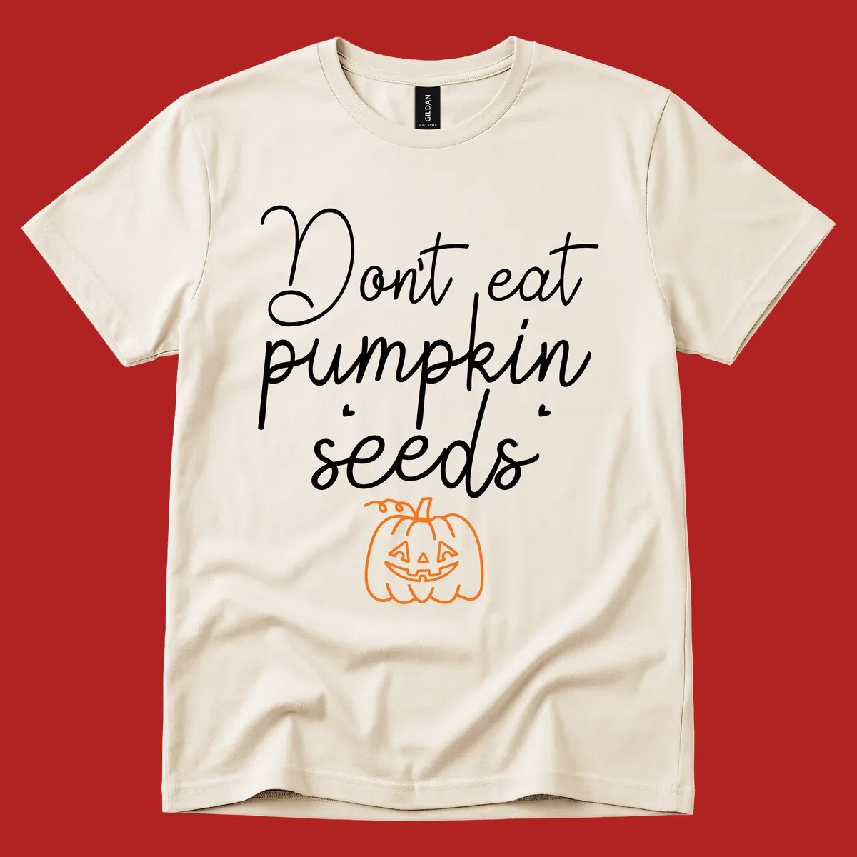 Don't eat pumpkin seeds Halloween text with jack-o-lantern illustration