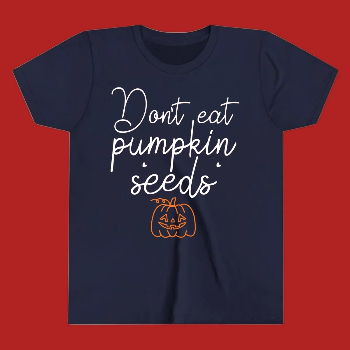 Don't eat pumpkin seeds Halloween text with jack-o-lantern illustration