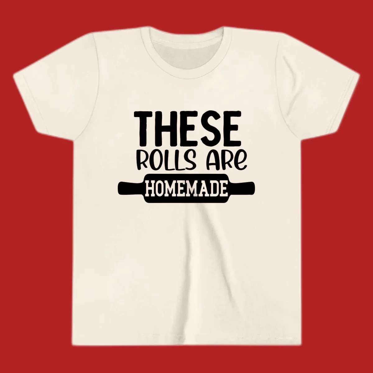 White text 'THESE ROLLS ARE HOMEMADE' with a rolling pin illustration, for homemade rolls baking concept.