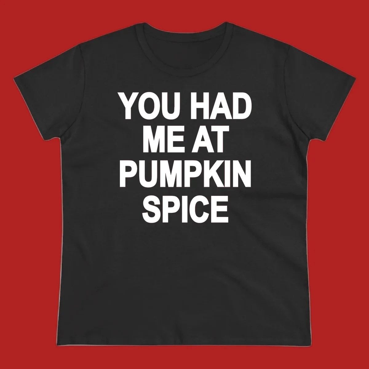 White typography design that says "YOU HAD ME AT PUMPKIN SPICE" for pumpkin spice lovers.