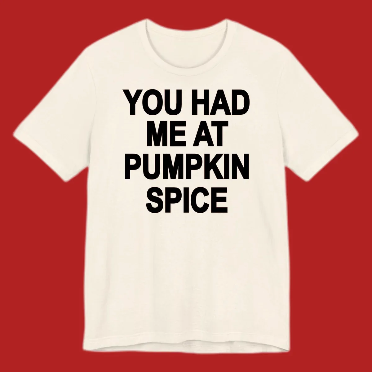 White typography design that says "YOU HAD ME AT PUMPKIN SPICE" for pumpkin spice lovers.