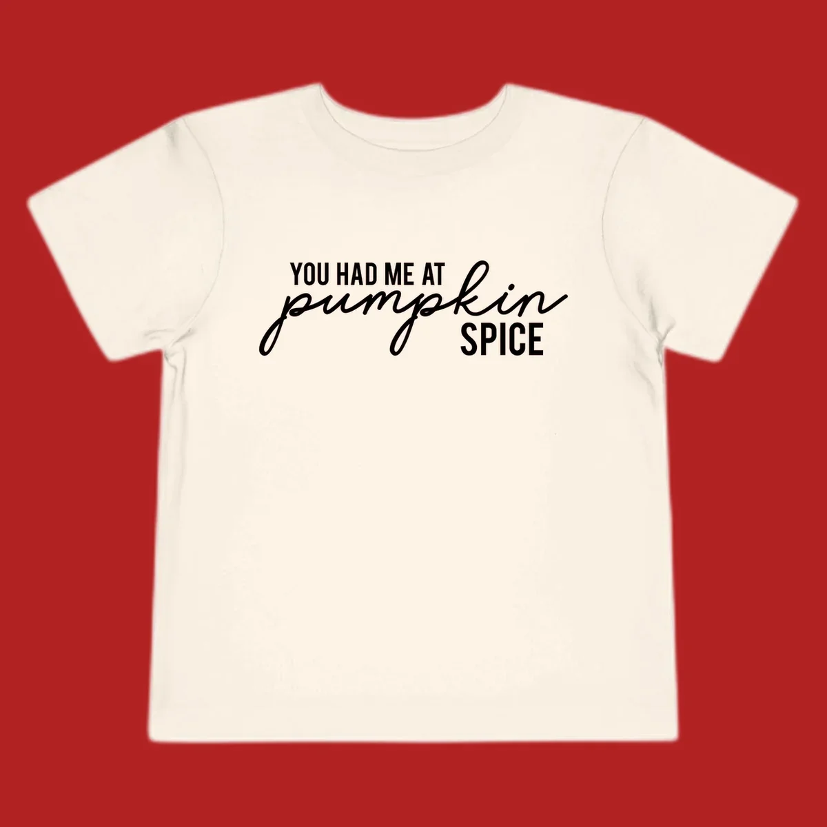 Typography design with the phrase You Had Me At Pumpkin Spice, celebrating fall.