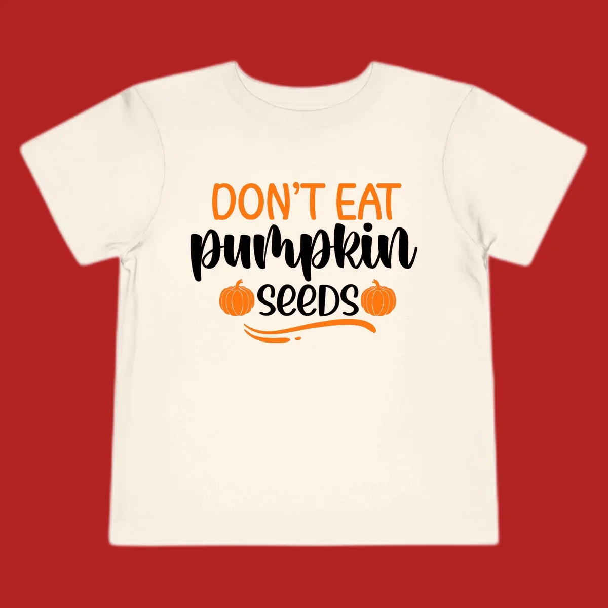 Don't Eat Pumpkin Seeds Fall Saying with pumpkins and swirls