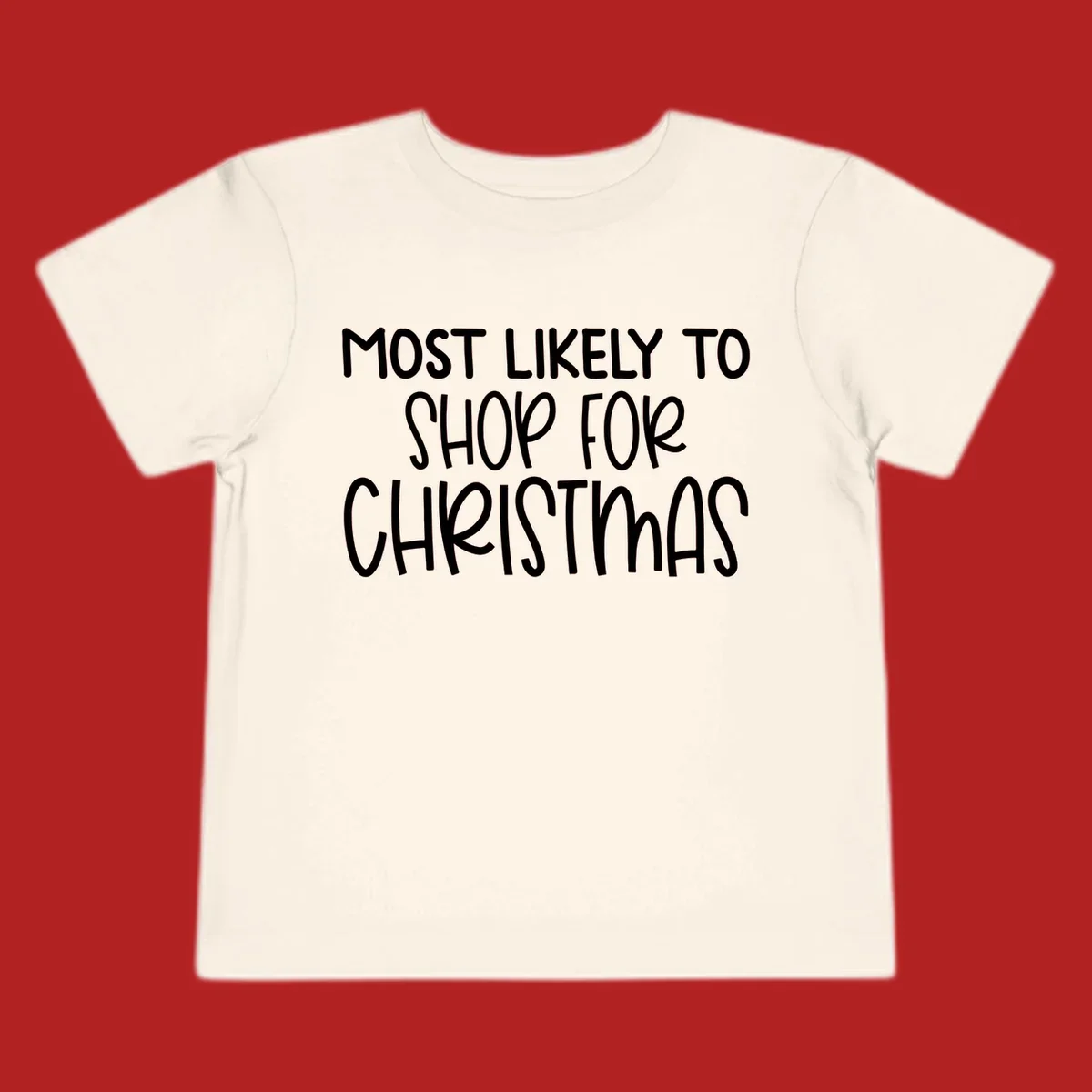Text design reading 'Most Likely To Shop For Christmas' in white lettering.