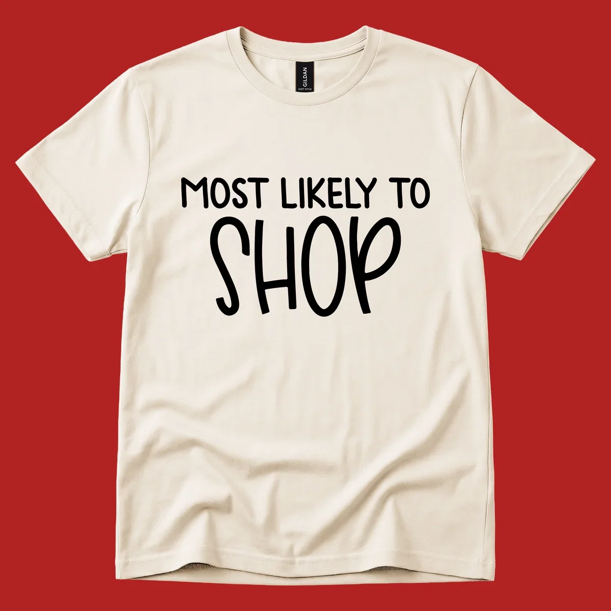 White text that says MOST LIKELY TO SHOP on a black background. Design for shop til you drop.