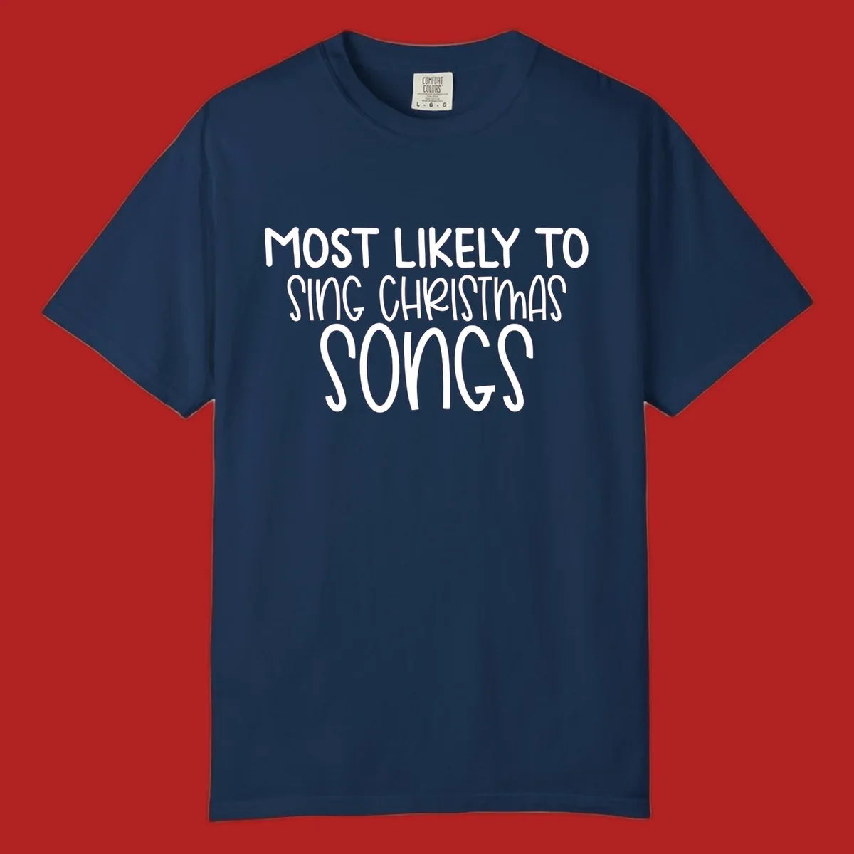 Text design 'Most Likely To Sing Christmas Songs' in white, bold lettering.