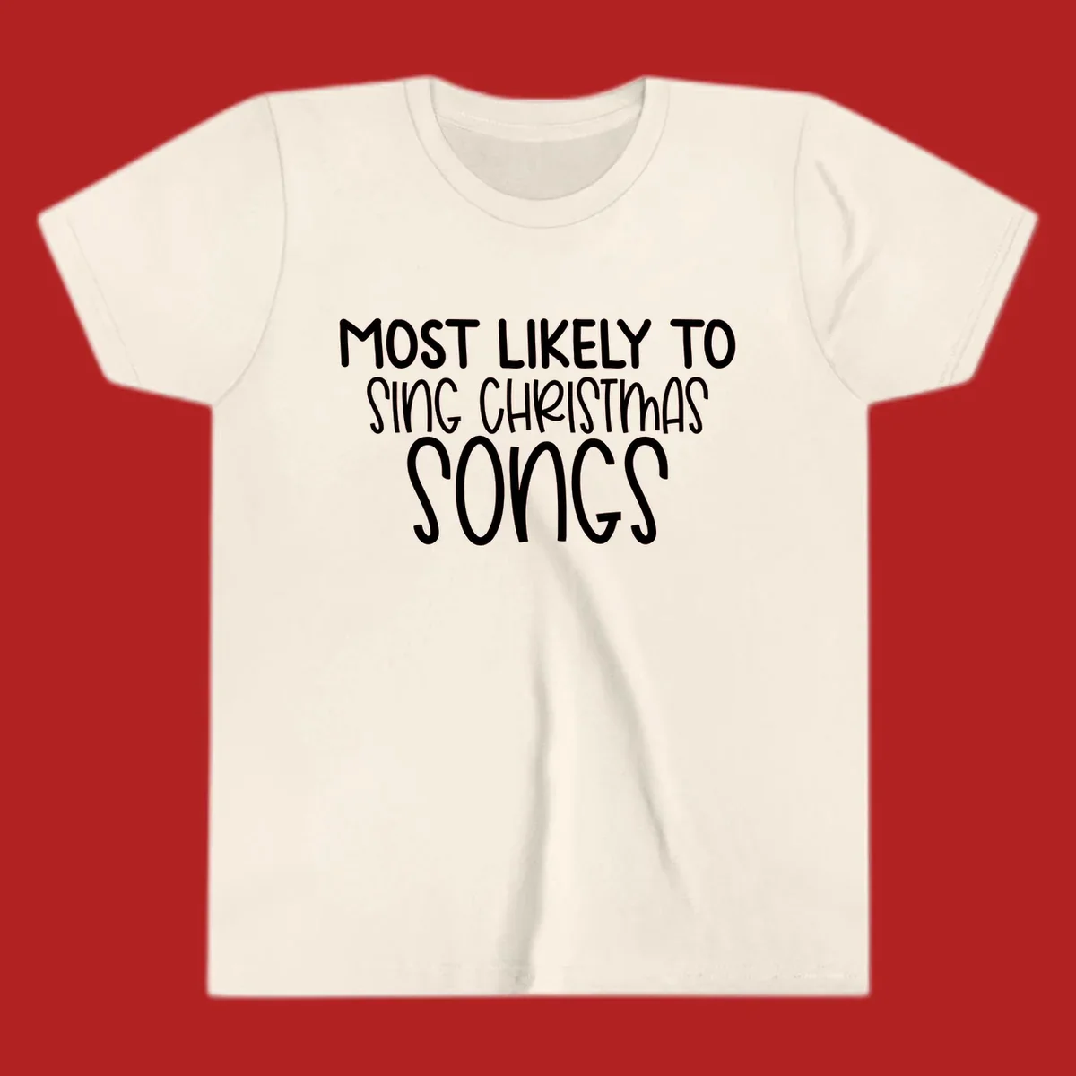 Text design 'Most Likely To Sing Christmas Songs' in white, bold lettering.