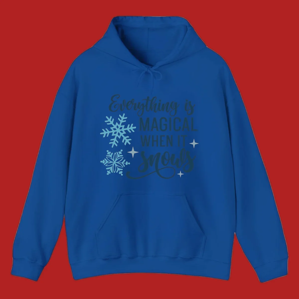 Everything is Magical When It Snows typography with snowflakes and stars.