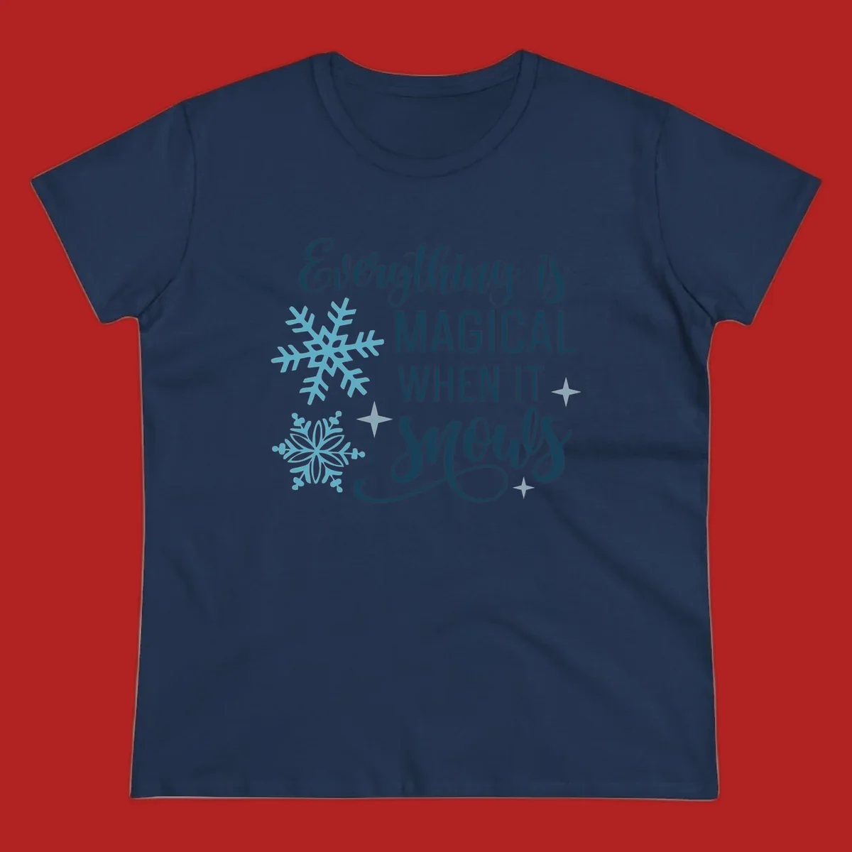 Everything is Magical When It Snows typography with snowflakes and stars.
