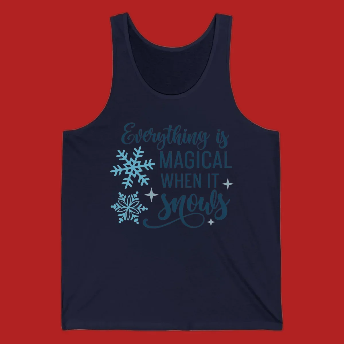 Everything is Magical When It Snows typography with snowflakes and stars.
