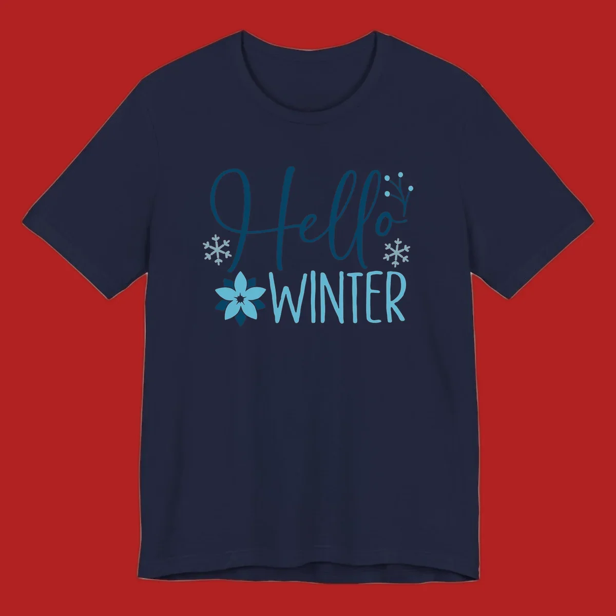 Hello Winter graphic with script text, snowflakes, and winter flower.