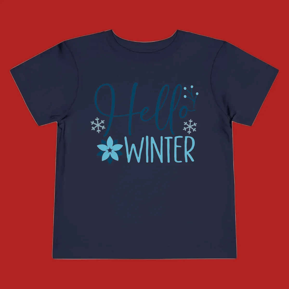 Hello Winter graphic with script text, snowflakes, and winter flower.