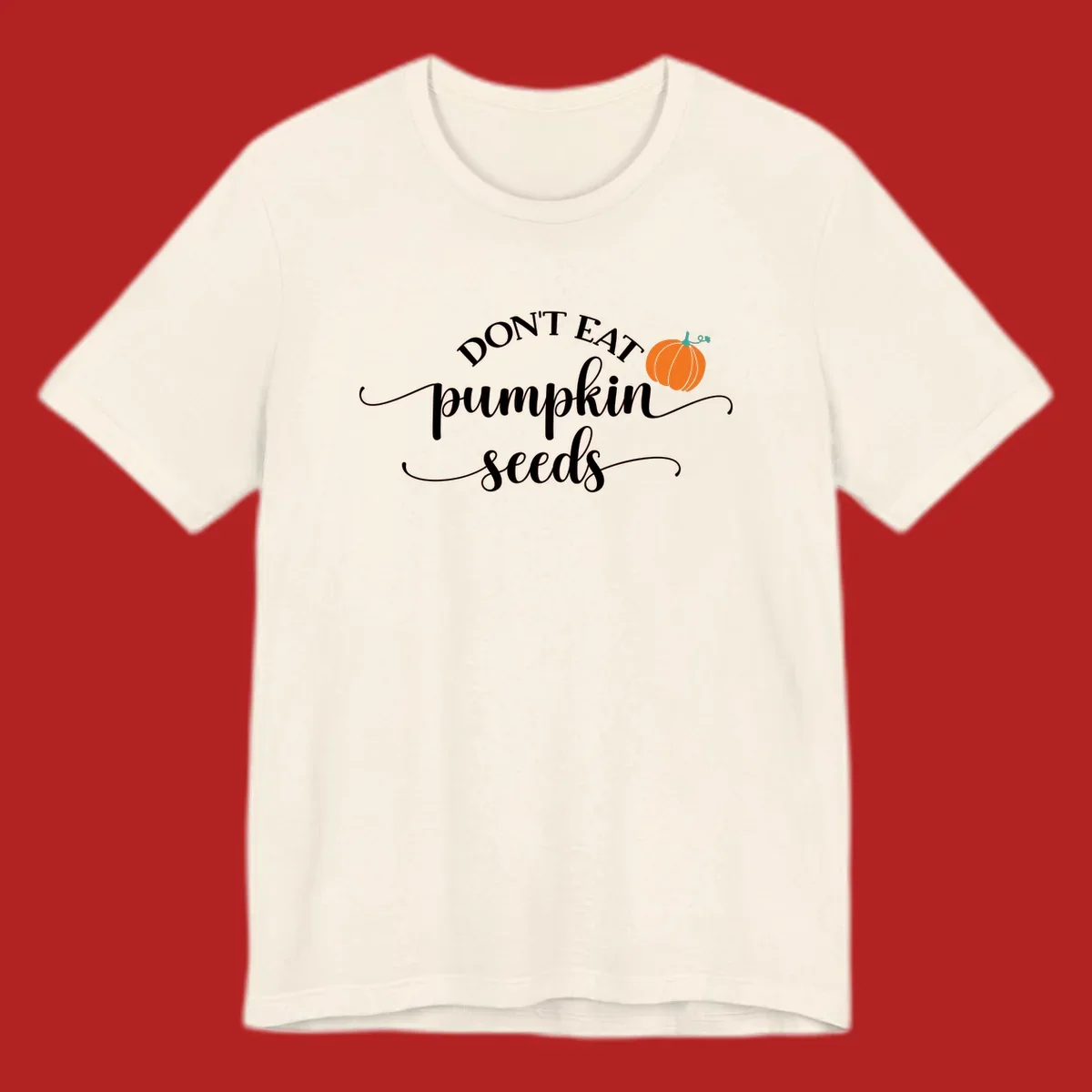 Don't Eat Pumpkin Seeds fall phrase with pumpkin illustration.