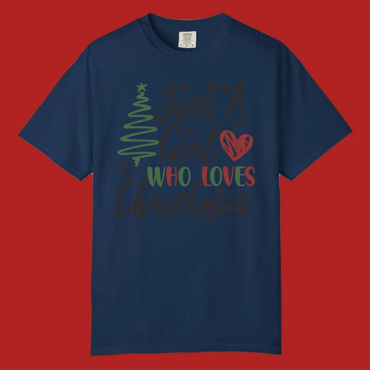 Girl who loves Christmas typography with tree and heart graphic.