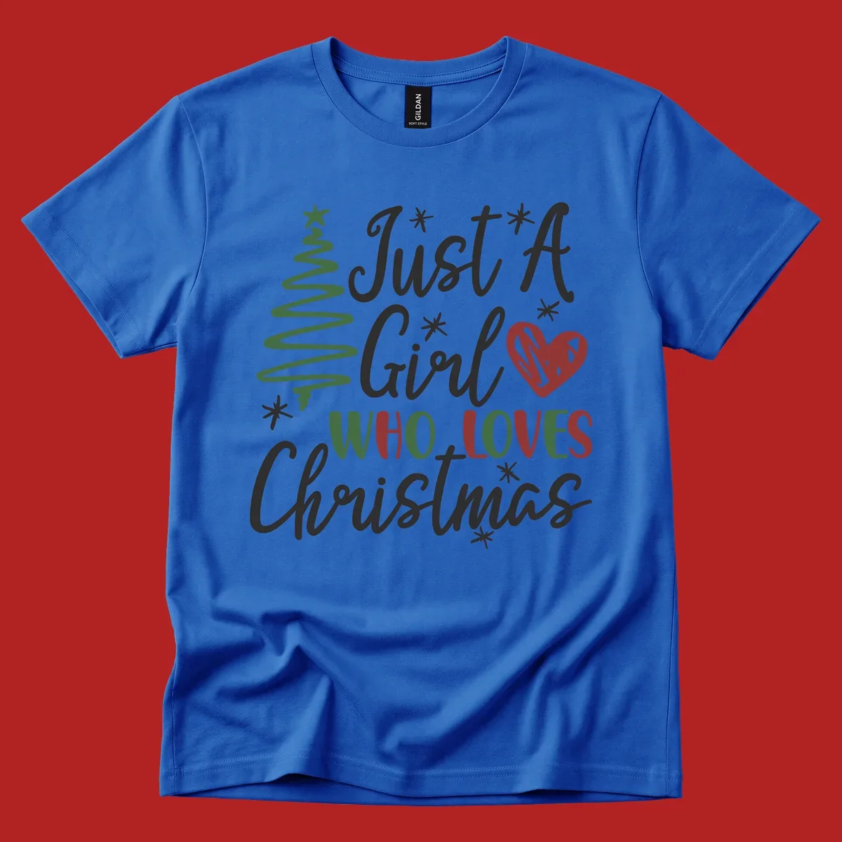 Girl who loves Christmas typography with tree and heart graphic.