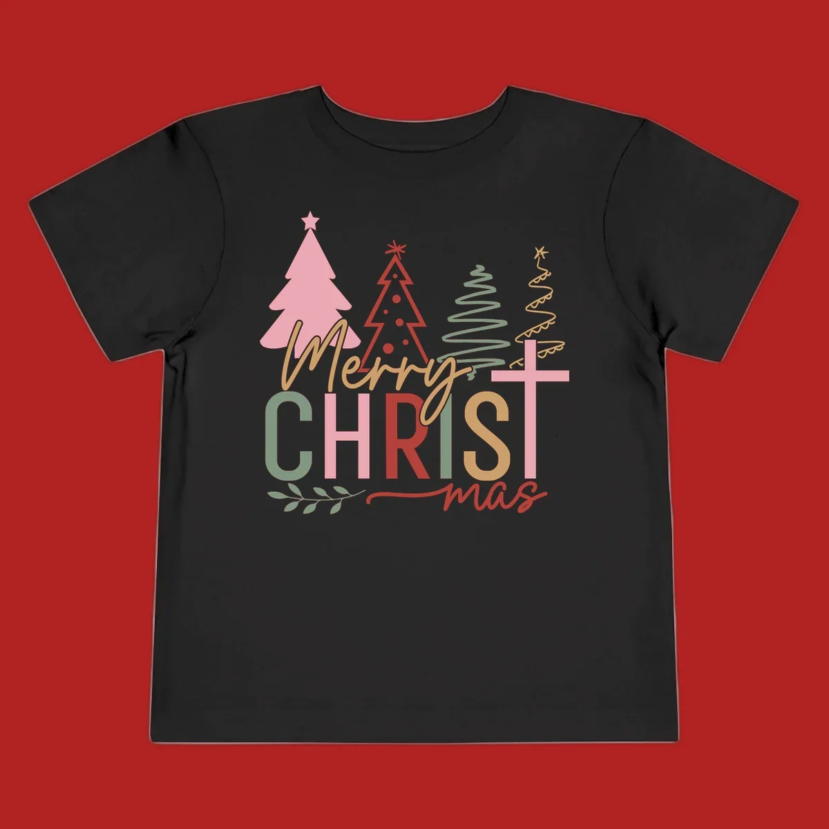 Merry Christmas text with stylized trees and a cross design.