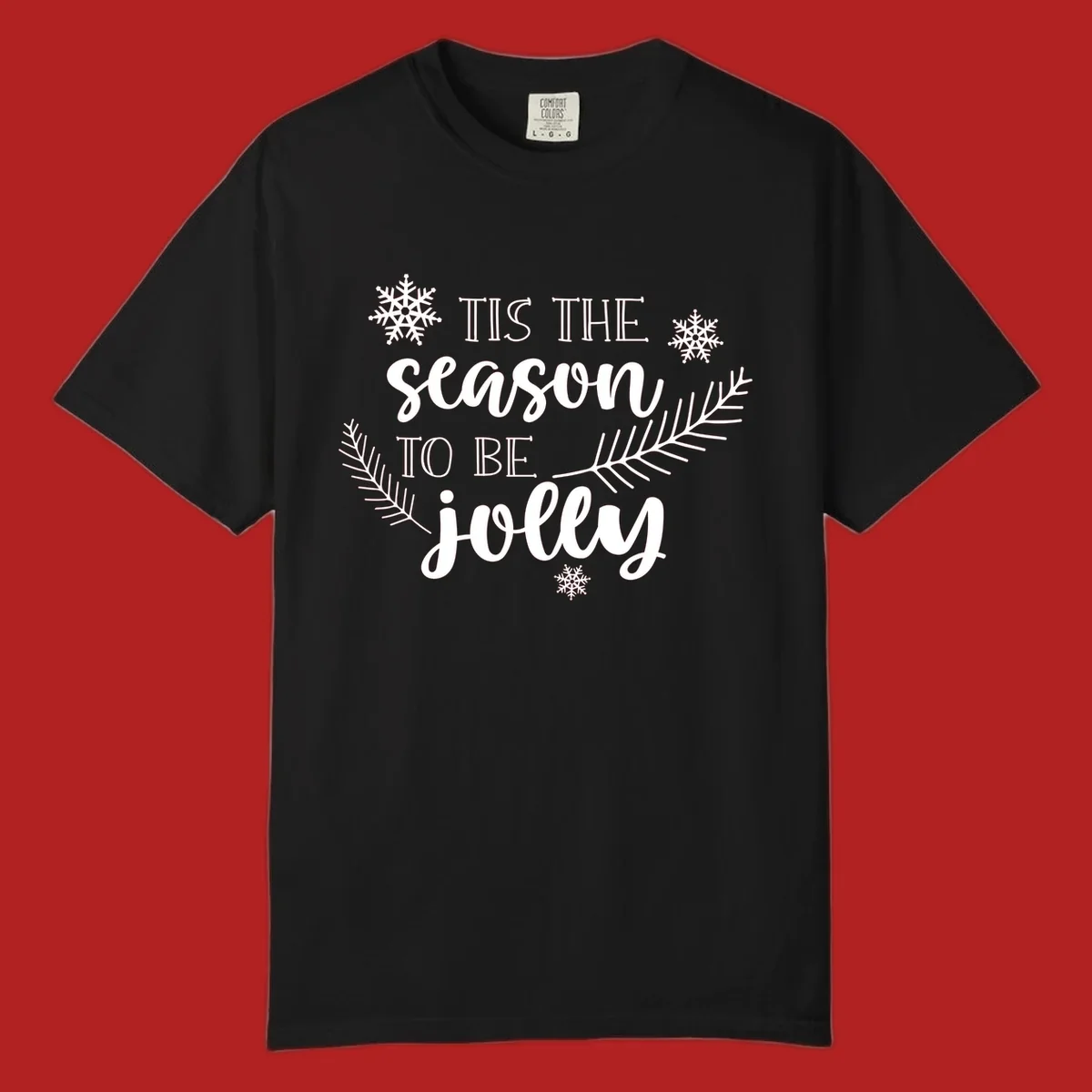 Tis the season to be jolly Christmas design with snowflakes and pine branches.