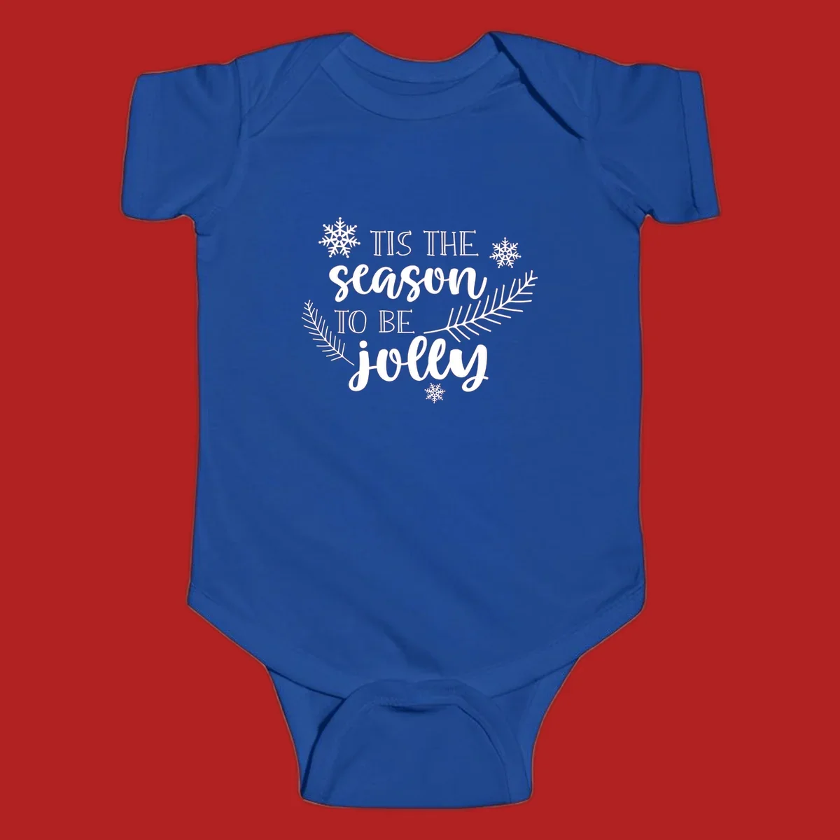 Tis the season to be jolly Christmas design with snowflakes and pine branches.