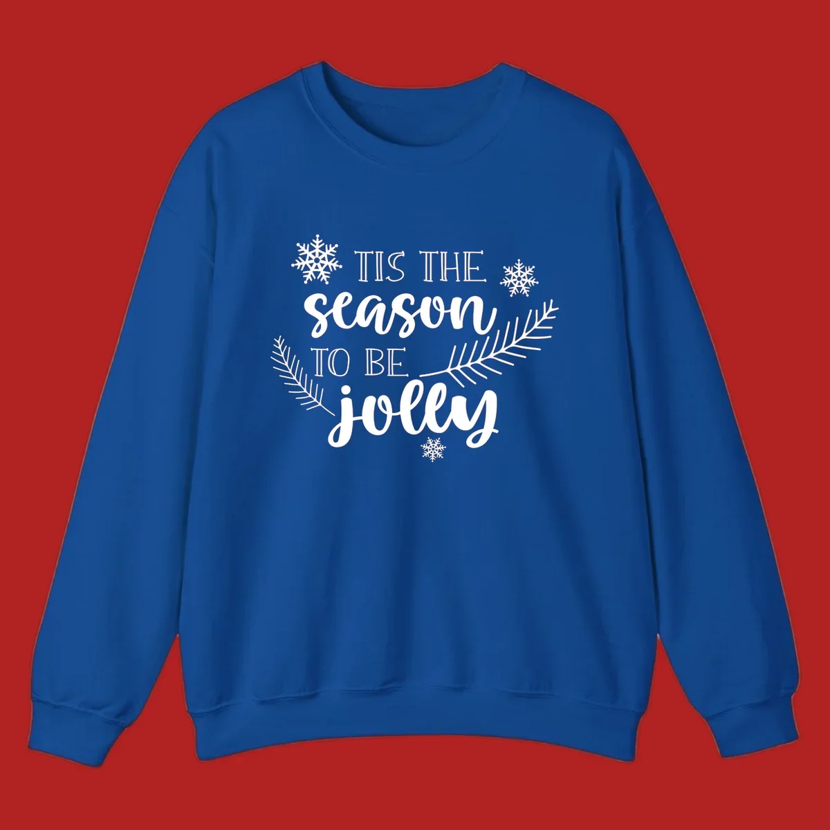 Tis the season to be jolly Christmas design with snowflakes and pine branches.