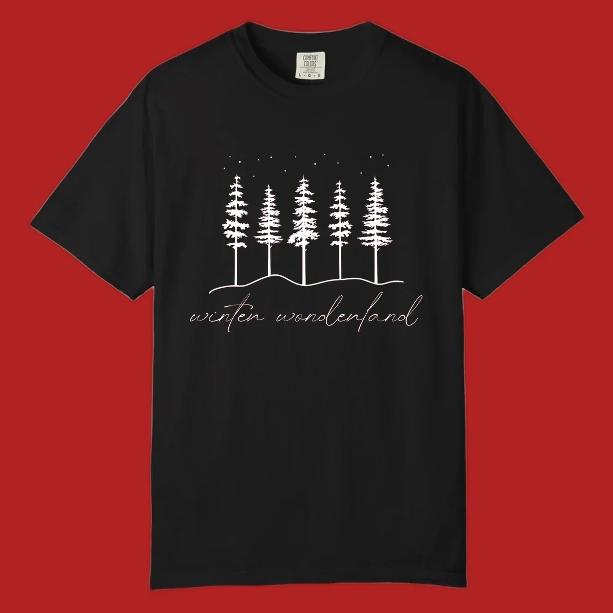 Winter wonderland forest scene with pine trees and stars, text 'winter wonderland'.