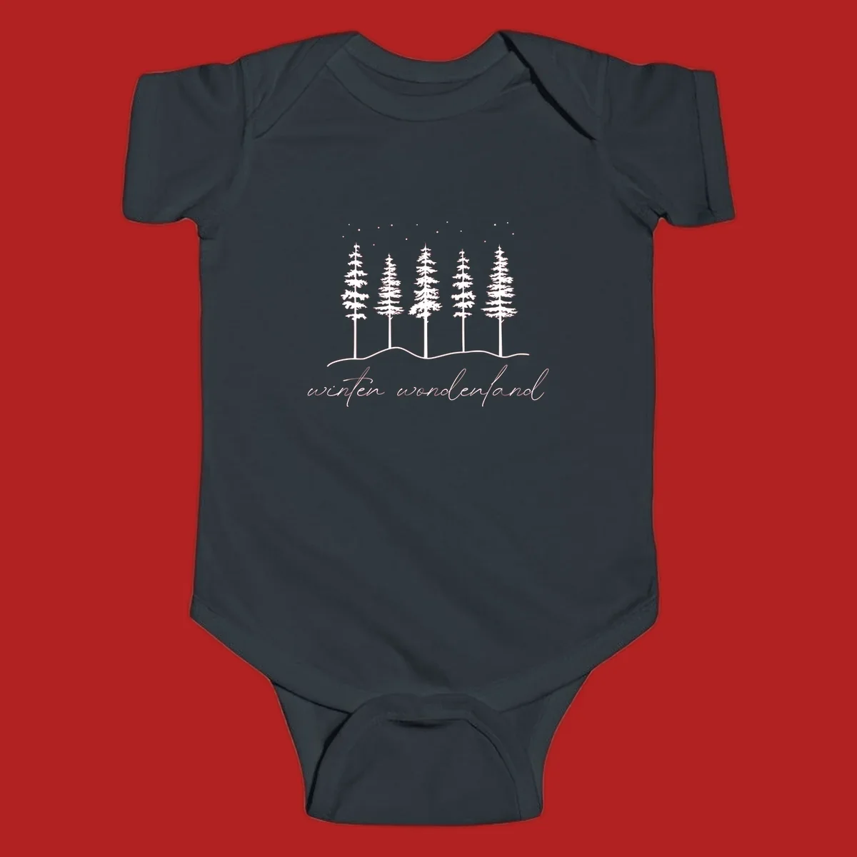 Winter wonderland forest scene with pine trees and stars, text 'winter wonderland'.