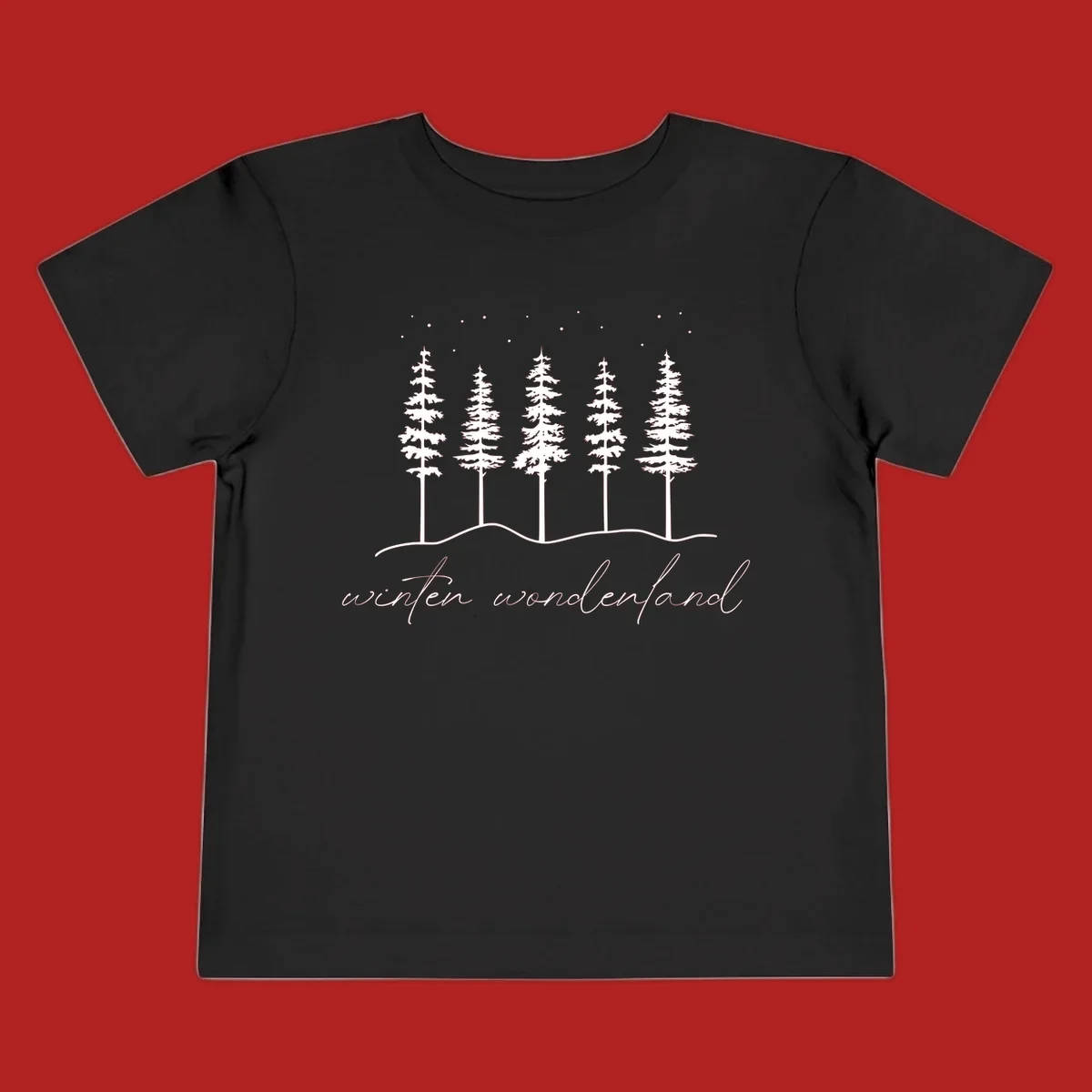 Winter wonderland forest scene with pine trees and stars, text 'winter wonderland'.