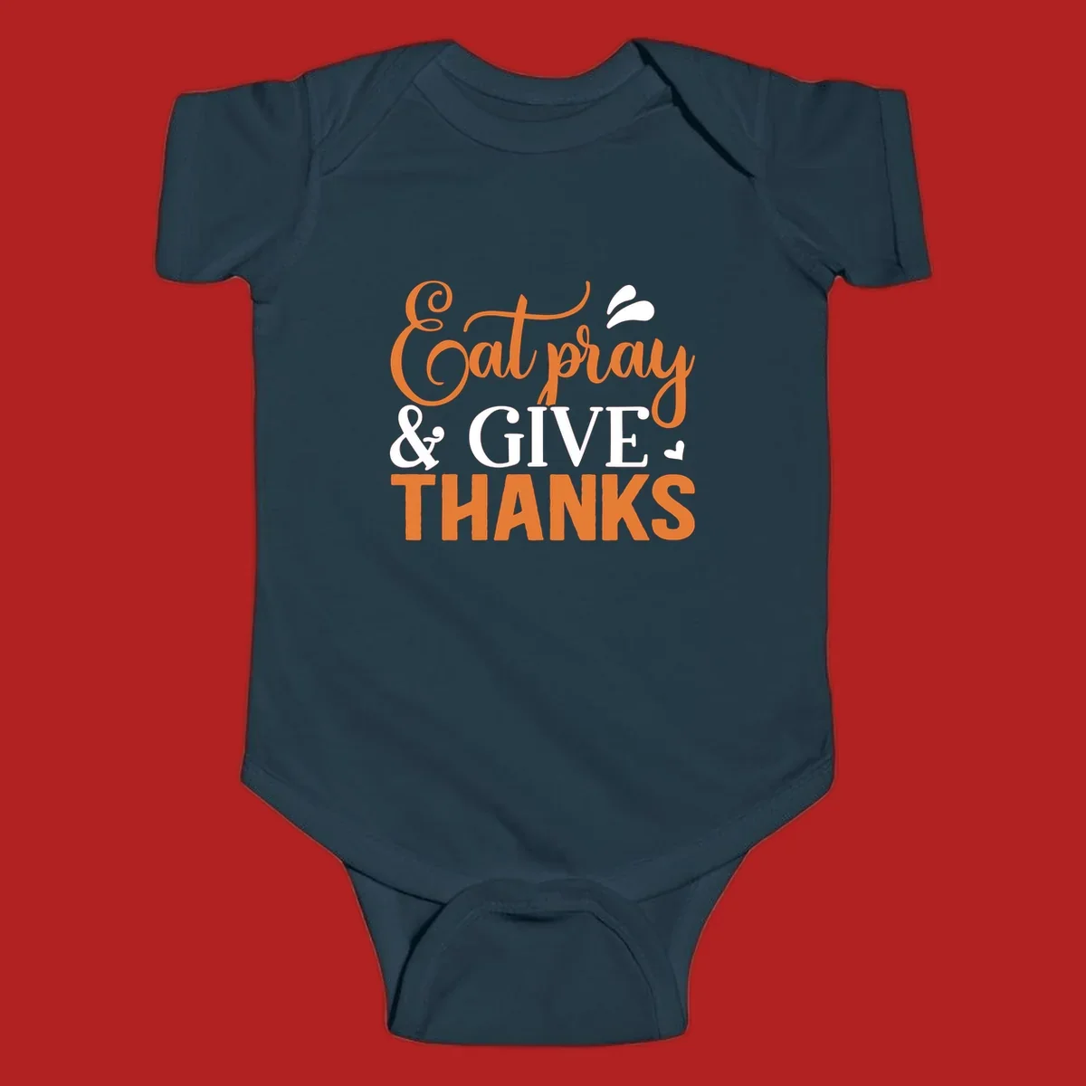 Eat Pray Give Thanks text design with orange, white, and black lettering.