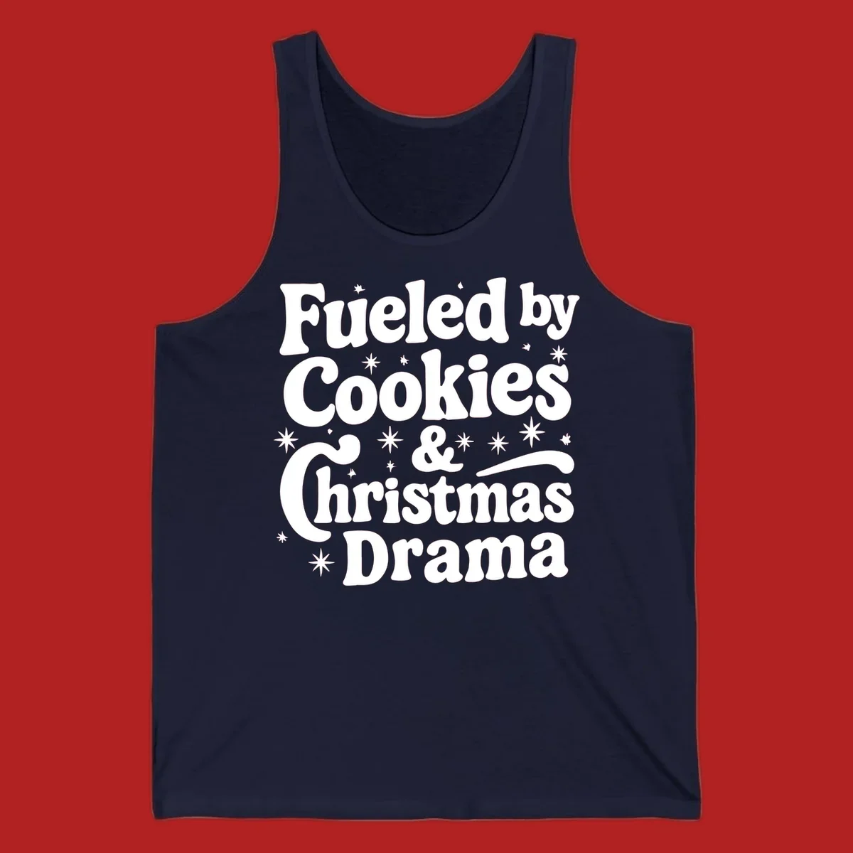 Text design 'Fueled by Cookies & Christmas Drama' with stars, for Christmas.