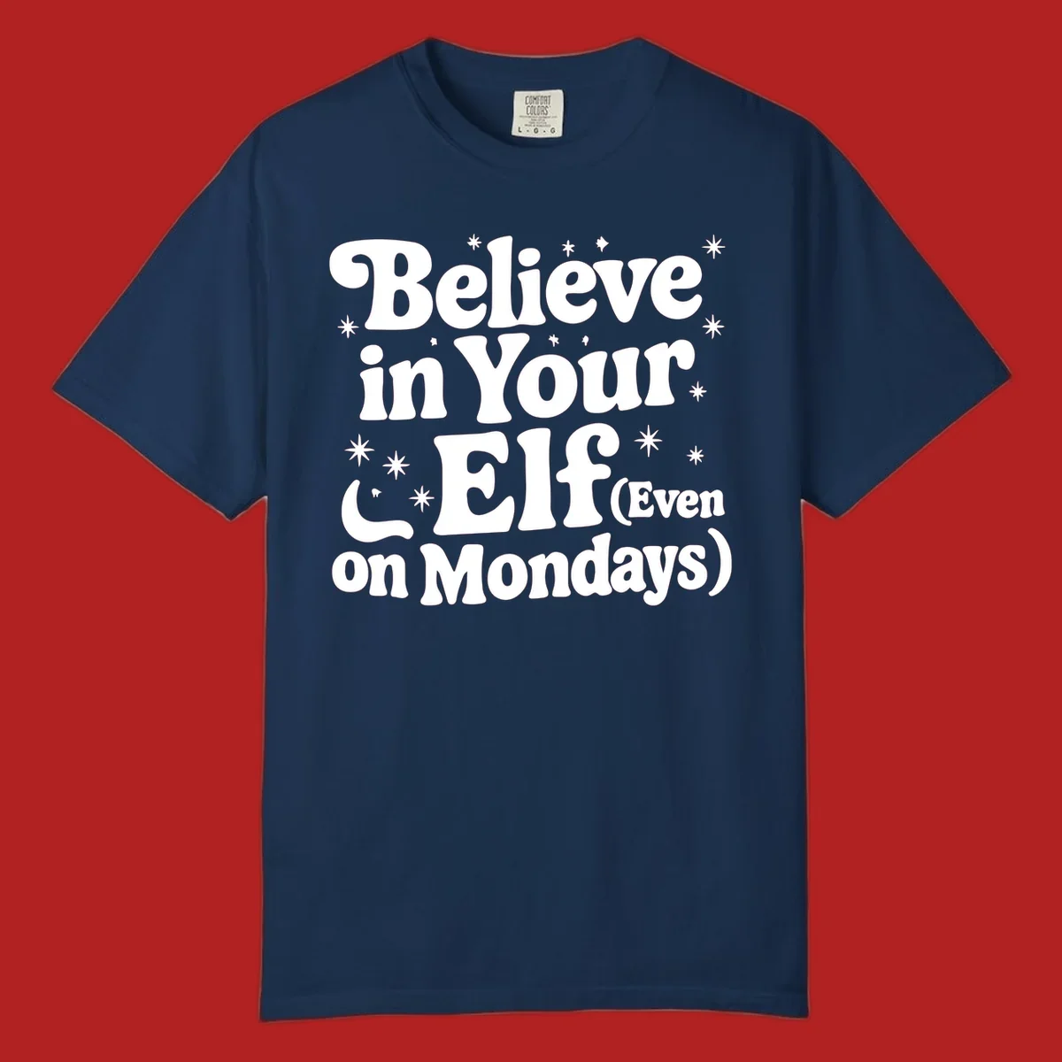 Believe in Your Elf text with stars and sparkles, retro font.